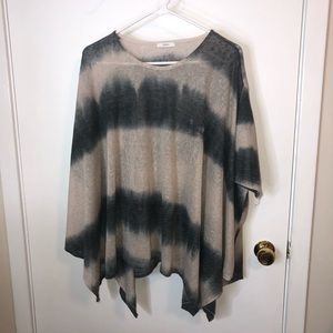 very cute, flowy sweater. never worn before.